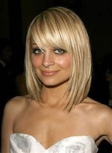 Medium Length Haircuts With Side Swept Bangs