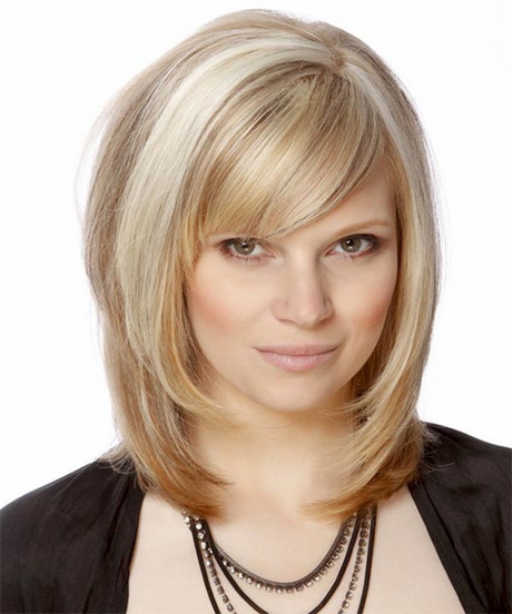  Medium  hairstyles with bangs  and layers 